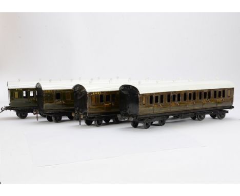 A Rake of Four substantially­ -repainted Bassett-Lowke Gauge I Coaching Stock, of the ‘1921’ type in SR olive green with yell