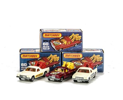 Matchbox Superfast MB-60C Holden Pick-Up, three examples, first cream body, red bikes, “Honda” label, second cream body, red 