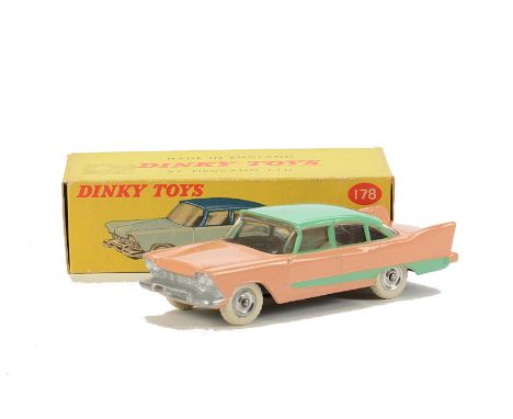 A Dinky Toys 178 Plymouth Plaza, light pink body, light green roof and side flash, spun hubs, in original box, E, box F-G, la