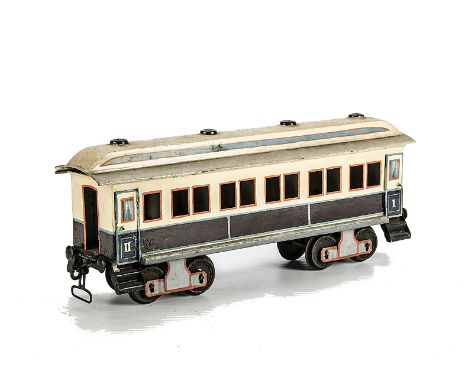 A Märklin Gauge I ‘Kaiserwagen’ type Corridor Bogie Coach, Märklin reference 1841.201, in brown and cream with orange-red win