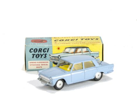 A Corgi Toys 217 Fiat 1800 Saloon, light blue body, bright yellow interior, smooth hubs, in original box, VG-E, box F-G