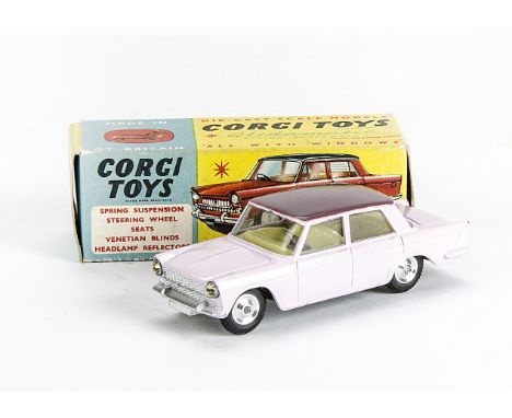 A Corgi Toys 232 Fiat 2100, pale pink body, mauve roof, lemon interior, spun hubs, in original box, E, light scratch to bonne