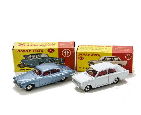 A Dinky Toys 142 Jaguar Mark X, light metallic blue body, red interior, spun hubs, E, 136 Vauxhall Viva, white body, red inte