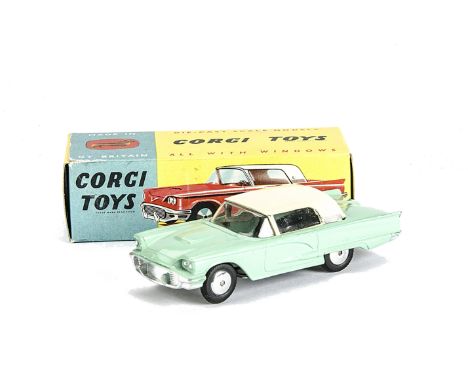 A Corgi Toys 214 Ford Thunderbird, pale green body, cream hardtop, no interior, smooth hubs, in original box, E, box G-VG
