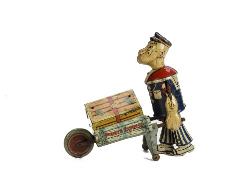 A Marx Tinplate Clockwork Popeye & Baggage, 1930s novelty figure with detailed ‘Popeye Express’ barrow, large tinplate front 