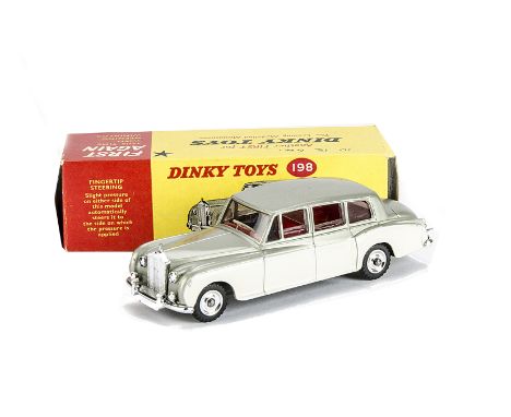 A Dinky Toys 198 Rolls-Royce Phantom V, metallic light green upper, cream lower, red interior, blue driver, spun hubs, in ori