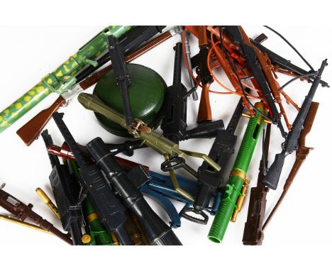 A Large Quantity of Palitoy Action Men Weapons, comprising SLR Rifle, No.34720 105mm Light Gun and other guns and missiles, i