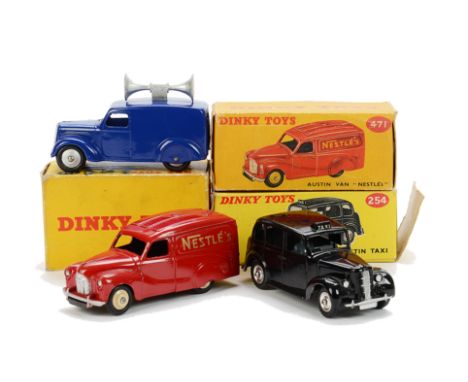 A Dinky Toys 471 Austin ‘Nestles’ Van, red body, cream hubs, 492 Loud Speaker Van, dark blue body, silver hubs, 254 Austin Ta