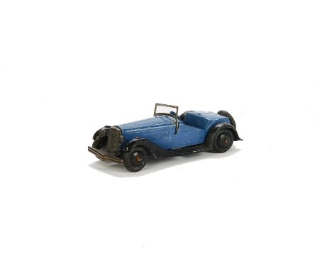 A Pre-War French Dinky 24h 2-Seat Sports Car, blue body, black criss-cross chassis, smooth hubs, spare wheel, open windscreen