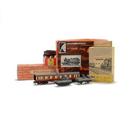 An Assortment of 00 Gauge Trains by Trix Farish and K’s, comprising TTR crane truck set, two BR scale length coaches, a wagon