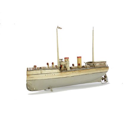 A Carette clockwork tinplate Two-Funnel Liner, hull in light grey and cream with black lining, light grey deck with hand-pain