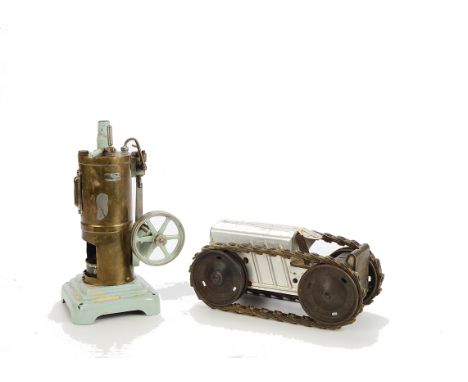 A Märklin vertical Steam Engine, with sight gauge, fly-wheel with lineshaft belt slot, repainted light blue stepped base and 