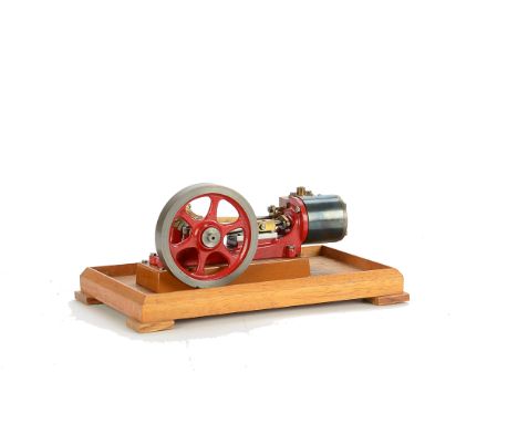 A Single-cylinder Horizontal Steam Engine, by Stuart Turner or similar, with 3” diameter flywheel, cylinder approx 3?4” x 1”,