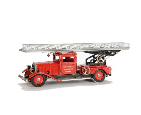 A Modern Märklin 1991 Tinplate Märklin Fire Engine, in red with ladder, two firemen, clockwork drive and electric lights, in 