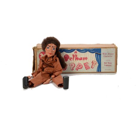 An uncommon Davy Crockett Pelham Puppet, with fur hat, dagger belt (no dagger) and small shoulder strap with bag, in an early