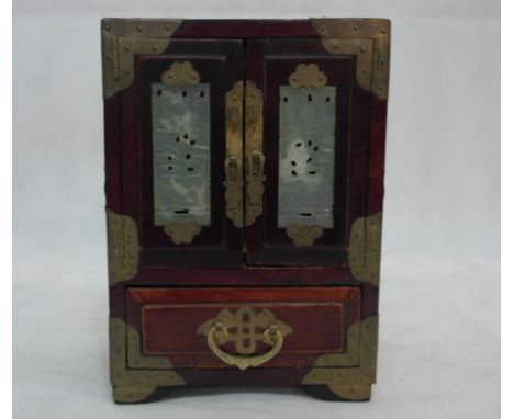 A Chinese hardwood and jade jewellery cabinet