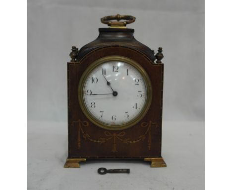 An Edwardian cased mantel clock
