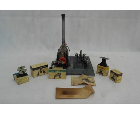 A Marklin steam/spirit engine with boxed accessories: saw, fan etc, c1950