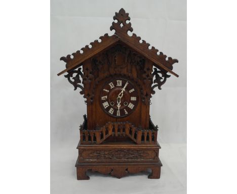 A late 19th century Bavarian cuckoo clock with good bellow and automaton, movement marked 'G.H.S.' with key: H 24" x W16"