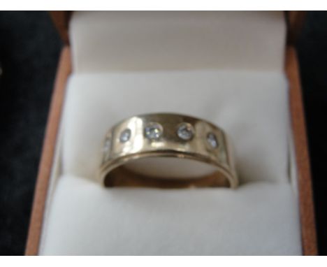 A large gentleman's 9ct diamond set dress ring