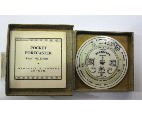 A cased Negretti and Zamba hand-held dial barometer