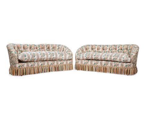 A PAIR OF KIDNEY SHAPED SOFAS IN VICTORIAN STYLECIRCA 2015Each with button backs above the removable seat cushion and bullion