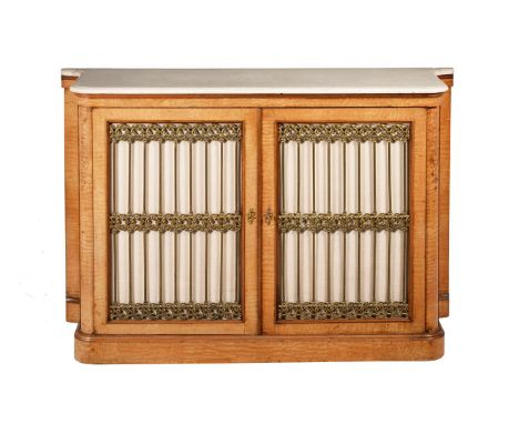A CONTINENTAL ASH, MARBLE AND GILT METAL SIDE CABINETMID 19TH CENTURYThe veneers of Hungarian ash cut type, the doors enclosi