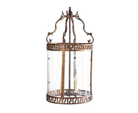 A GILT BRASS HANGING LANTERN IN REGENCY STYLE20TH CENTURYOf cylindrical form, with scrolling foliate frame86cm high, 47cm wid