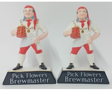 A pair of Brewmaster ceramic figures, 'Pick Flowers Brewmaster', height 24cm.