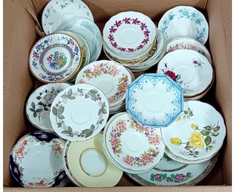 From the chapel tea rooms at Saltram House, National Trust. A collection of mismatched porcelain saucers and large plates, ma