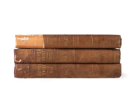 Three volume set of Oliver Twist, or The Parish  Boy's Progress by Boz (Charles Dickens). Published  1838 by Richard Bentley.