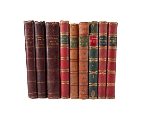 Nine volumes by Charles Dickens of the larger paper editions. Martin Chuzzlewit by Charles Dickens. Published by Chapman and 