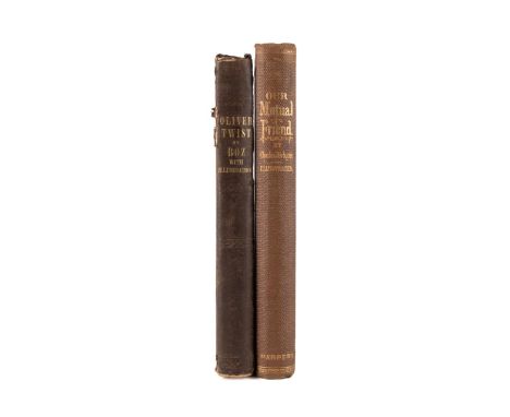 A collection of two American editions of works by  Charles Dickens: Oliver Twist by Charles Dickens.  Published 1844 by Lewis