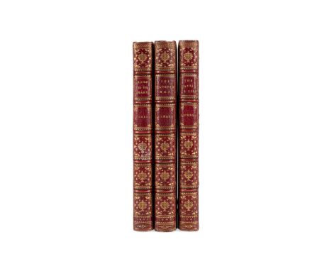 A finely bound three volume set of the following  Christmas stories by Charles Dickens: The Cricket  on the Hearth by Charles