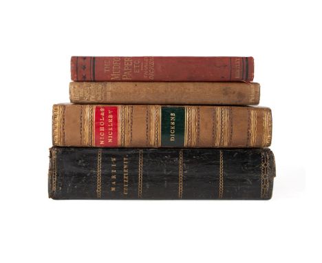 Four volumes of works by Charles Dickens: Martin  Chuzzlewit by Charles Dickens. Published 1844 by  Chapman and Hall. First e