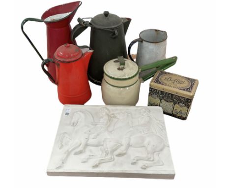 Collection of enamel jugs, tins and a plaster plaque etc