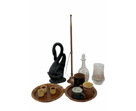 Box containing copper and brass hunting horn, cast metal door stop, glass decanter etc