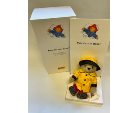 Paddington Steiff Bear, dressed in a yellow raincoat and hat with red wellington boots with original box [No.00219]