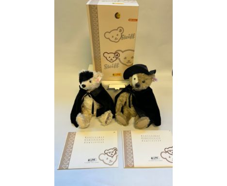 A pair of Phantom of the Opera Steiff bears, Dunkelbeige [30cm] voice controlled musical box [no.00530], with White/black Bea