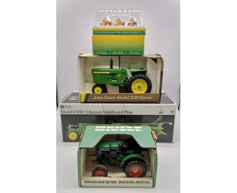 4 x Die Cast collectors tractors.John Deere F145H 5-Bottom Moldboard Plow, 1:16 scale.John Deere model 3010 tractor, 1:16 sca