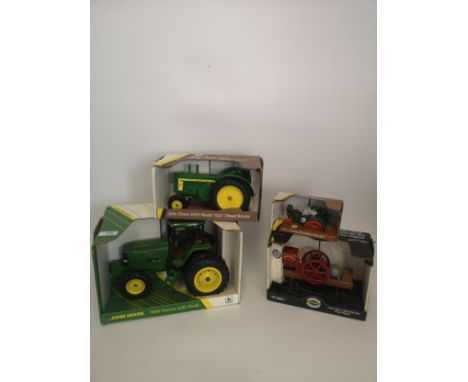 4 x Die Cast TractorsJohn Deere Waterloo Boy 2h.p. engine, 1:8 scale.John Deere Overtime Tractor, 1:32 scale.John Deere 1956 
