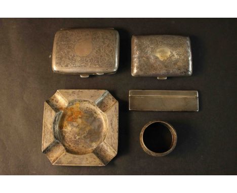 A collection of silver items, including a silver Art Deco engine decorated ashtray with four cigarette holders by Mappin and 