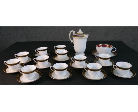 A collection of hand painted porcelain, including a set of twelve hand painted black and gold stylised floral design Royal Wo