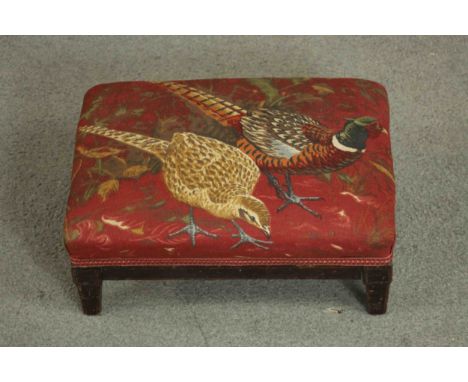 A 20th century foot stool with a padded tapestry top with pheasant design. H.15 W.37 D.28cm. 