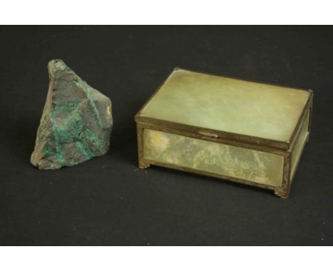 A 19th century jade panel and engraved brass jewellery box along with a piece of malachite. H.6 W.13 D.10cm. 