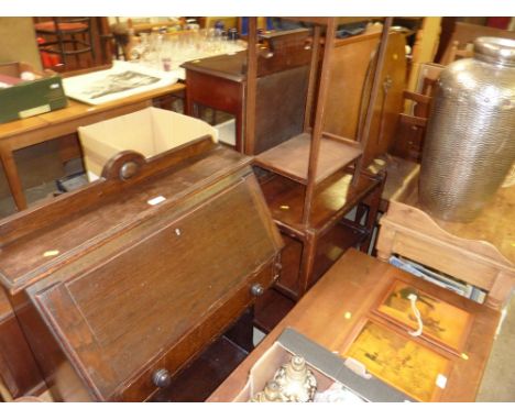 An oak single drawer bureau; a three tier trolley; two tables and a fire screen