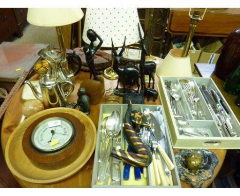 A quantity of Walker and Hall silver plated cutlery; various carved wooden animal ornaments; a barometer; table lamps; a pair