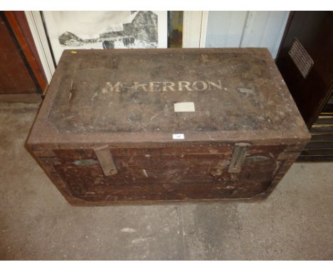 A large stained pine and metal bound trunk with metal lining
