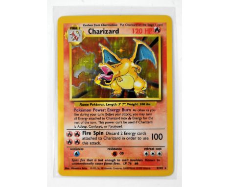 Pokemon TCG. Charizard Holo card number 4/102 from base Base Set (Unlimited). The iconic Charizard from the very first Pokemo
