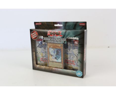 Yu-Gi-Oh! Light & Darkness Power Pack Sealed. This lot contains one sealed Light & Darkness Power Pack from 2007. Each sealed